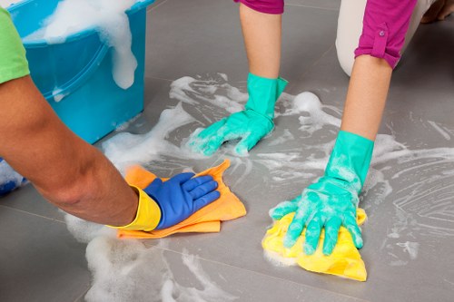 Carpet cleaning technician preparing equipment for a service booking